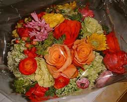 Orange Ranunculus and Roses